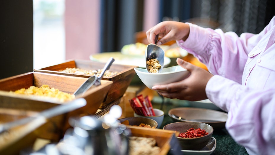 Hotel buffet crashers caught on camera loading up plates, walking out without paying Accountants Canberra